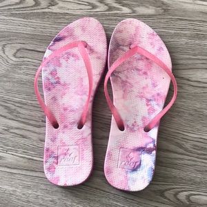 Fun pink marble flip flops by reef